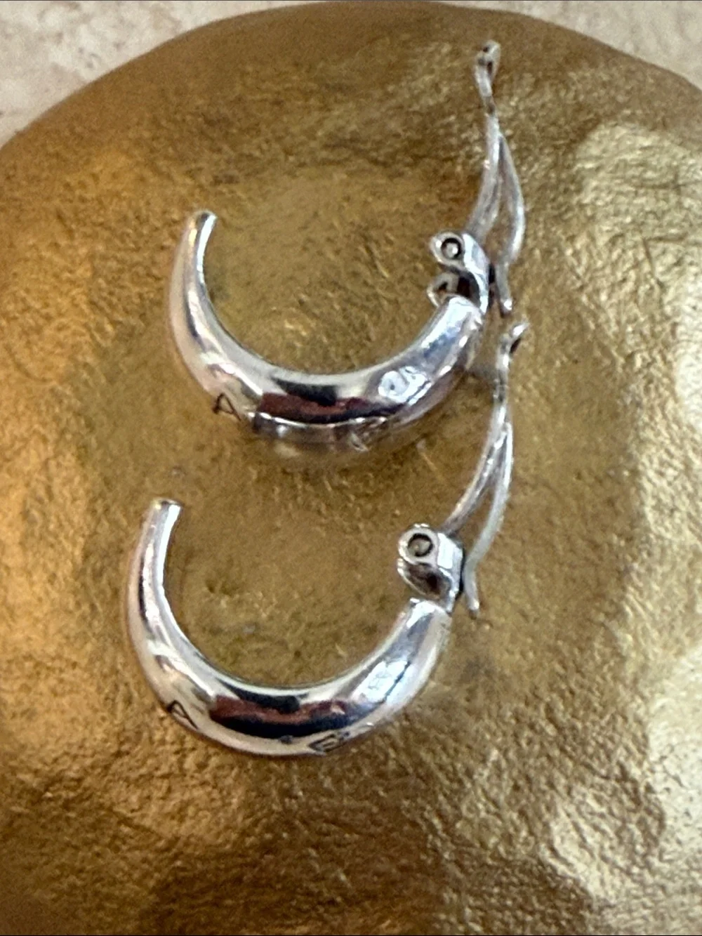 CHANEL Sterling Silver Logo Clip Hoop Earrings